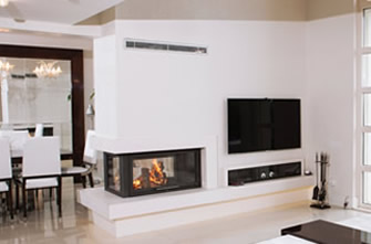 DOUBLE-SIDED FIREPLACE SURROUNDS